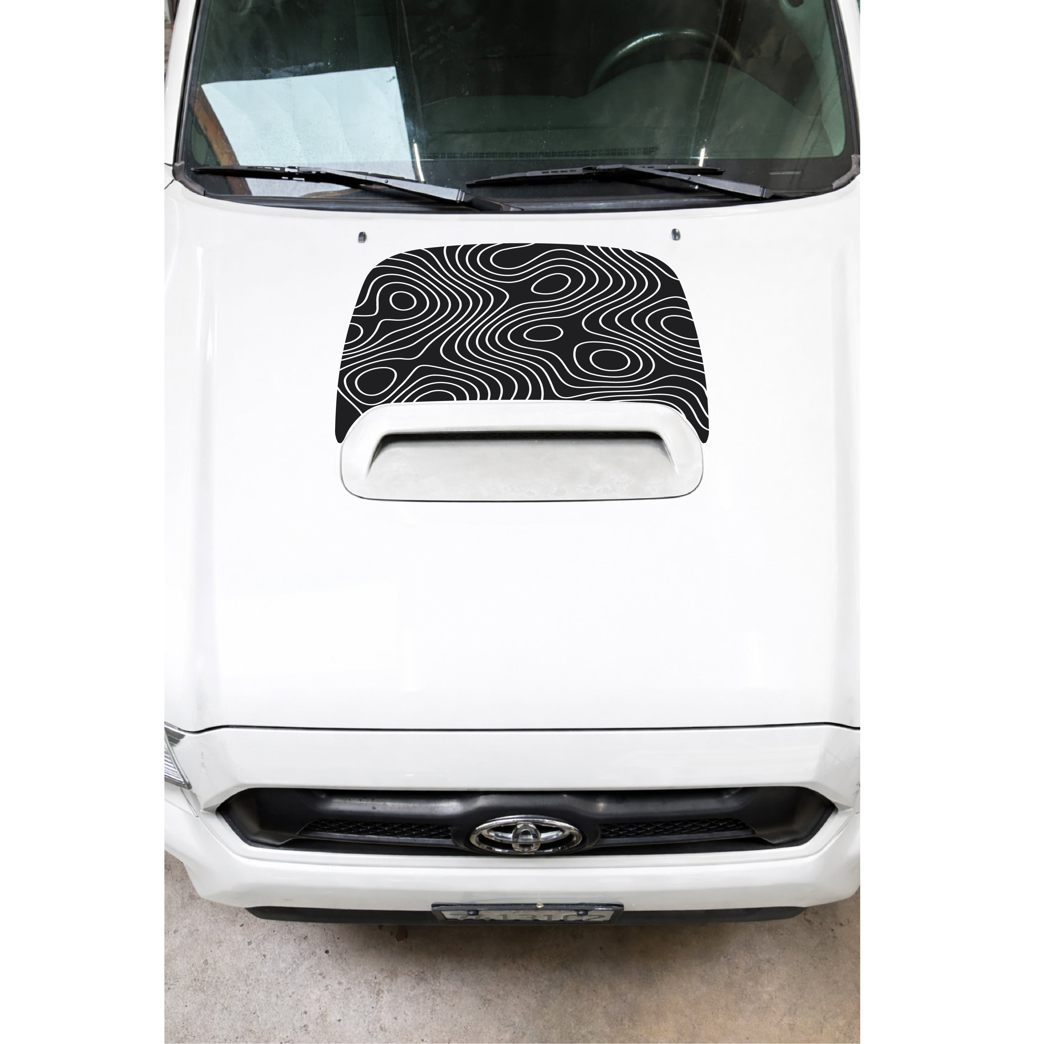 Toyota Tacoma 2nd trd gen with WildWrap DIY decal Topography hood scoop anti-glare coverage shown in black
